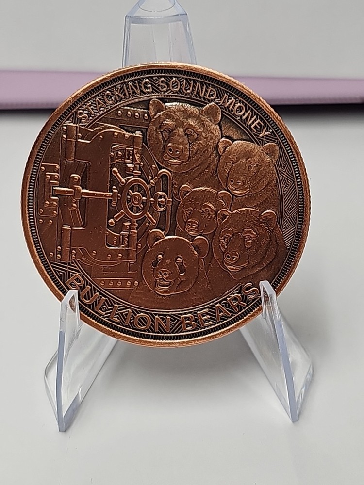 Black bear on a bicycle bullion stackers 1 oz premium colorized copper