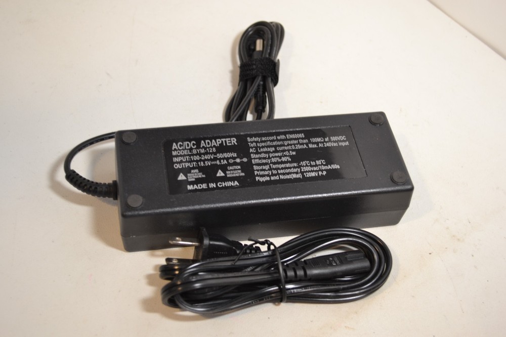 AC/DC Adapter Model: BYM-128