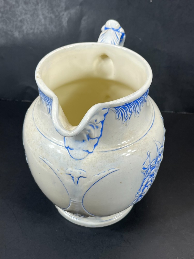 Christopher Colombus Studio Barna's Pottery Pitcher Blue White Relief Scene