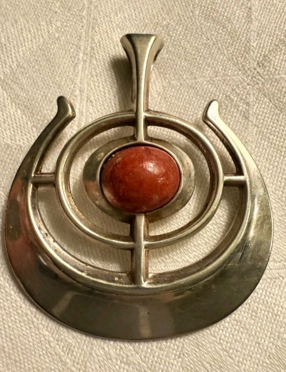 Gently used, David Andersen from the 1960s.Silver with Tulitt