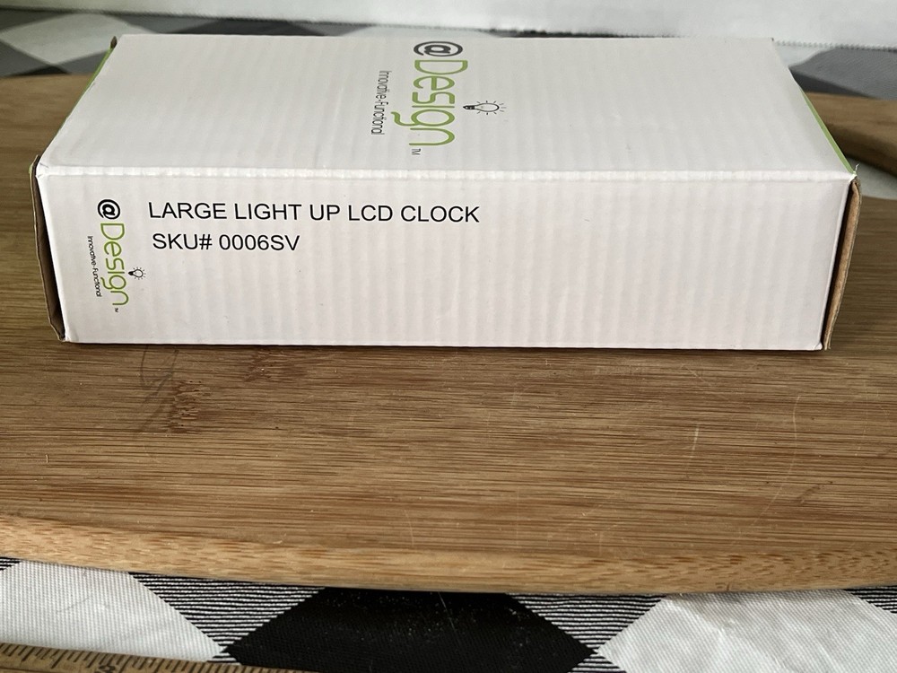 Design Innovative Functional 0006SV Large Light Up LCD Clock