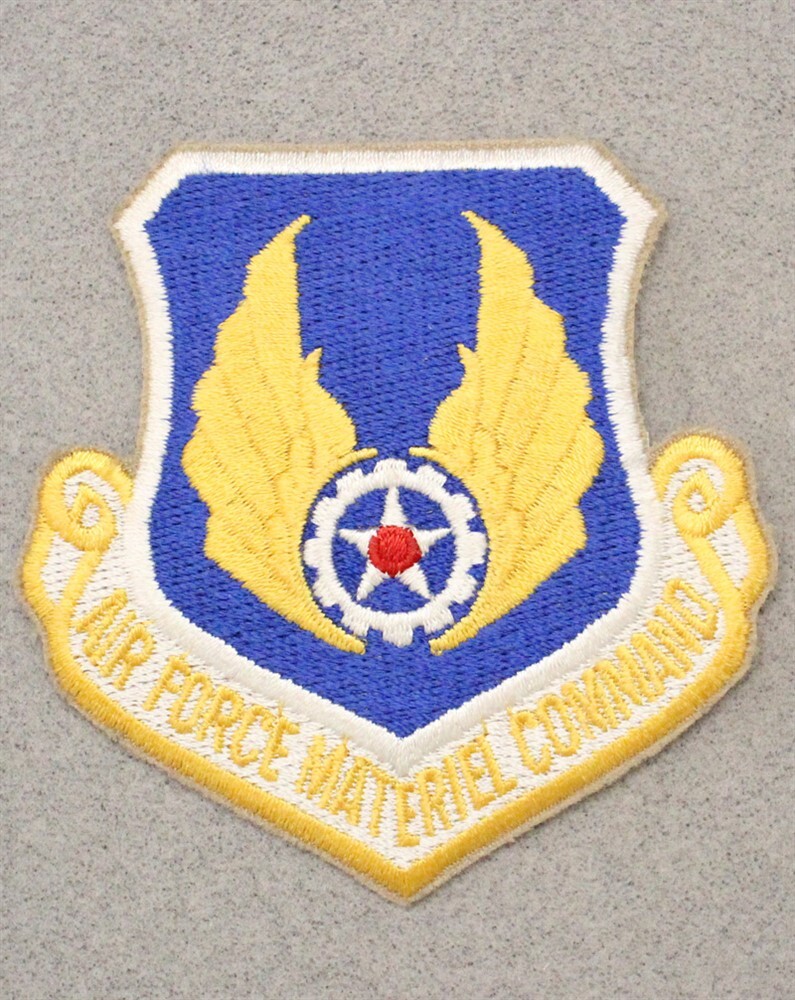 USAF Air Force Patch 105: Air Force Materiel Command, yellow motto - 3"