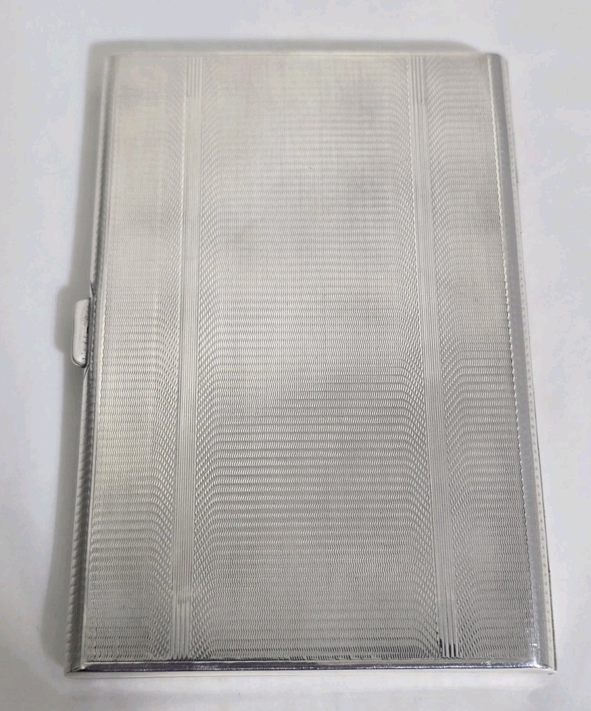 Antique sterling silver cigarette case. Engine turned decoration.Birmingham 1939
