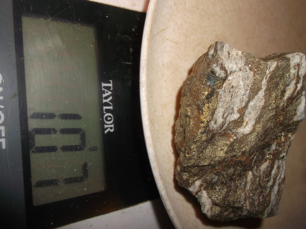 gold silver copper ore, 107 grams samples ,ore high grade .this is not
