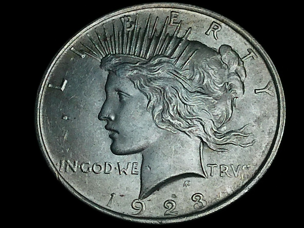 Raw 1923 Peace Silver Dollar - Philadelphia - Small Lamination Error