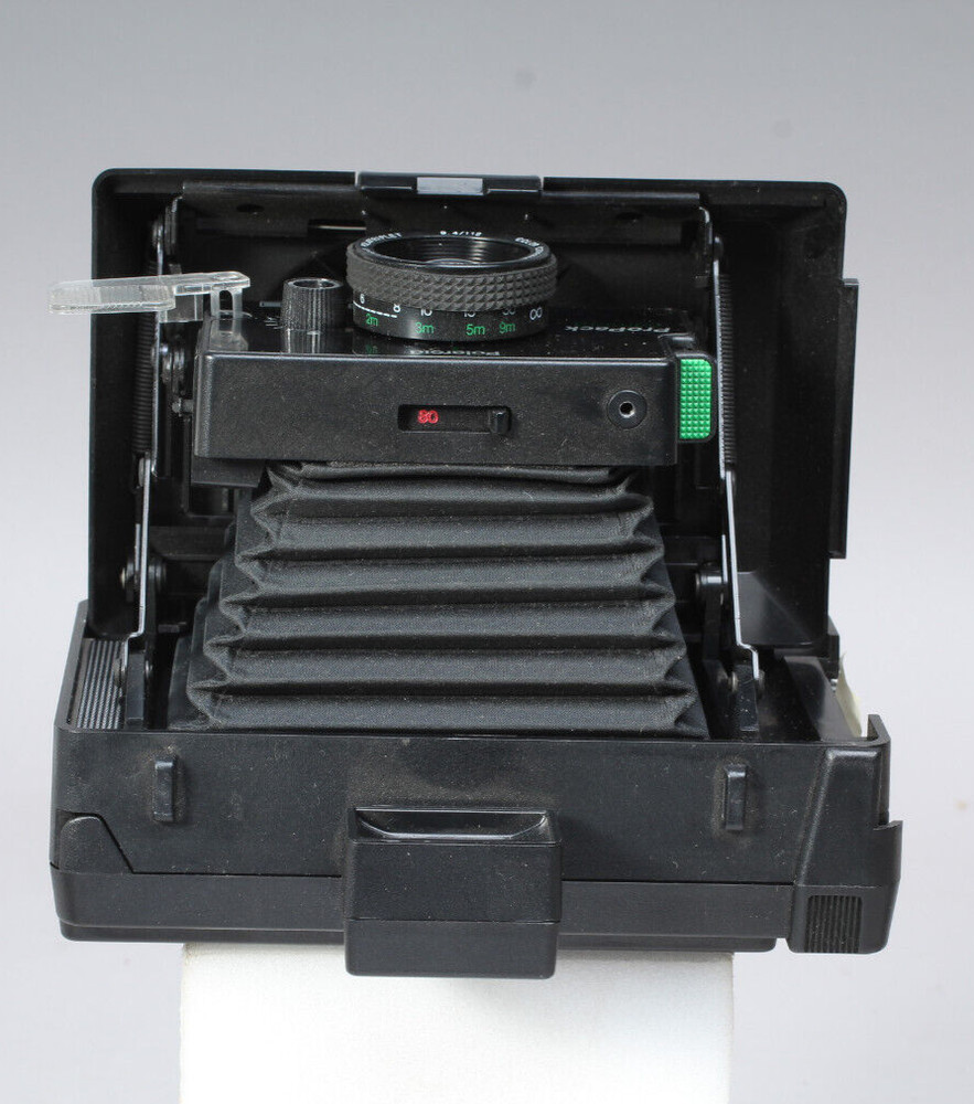 POLAROID PRO-PACK IN THE BOX W CAMERA FLASH STRAP & MANUALS FLASH BAD