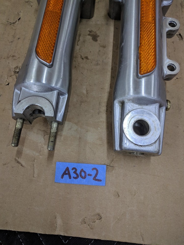 2000-2006 Harley-Davidson Softail Heritage Fat Boy Fork Lower Sliders READ