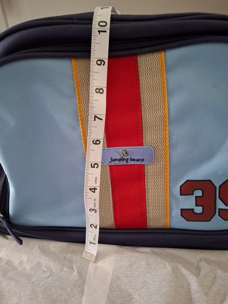 Jumping Beans Roller With Pull Out Handle Luggage Bowling Bag Zipper Closure