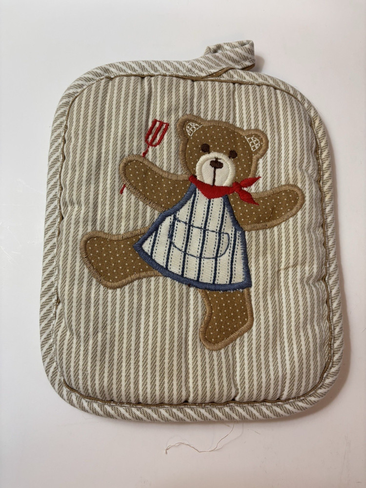 7 Potholders And Mittens In A Basket
