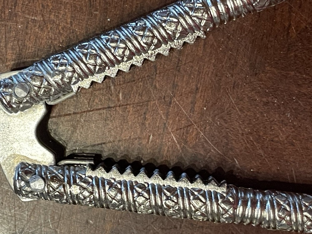 Vintage Handheld Metal Nutcracker w/ 4 picks