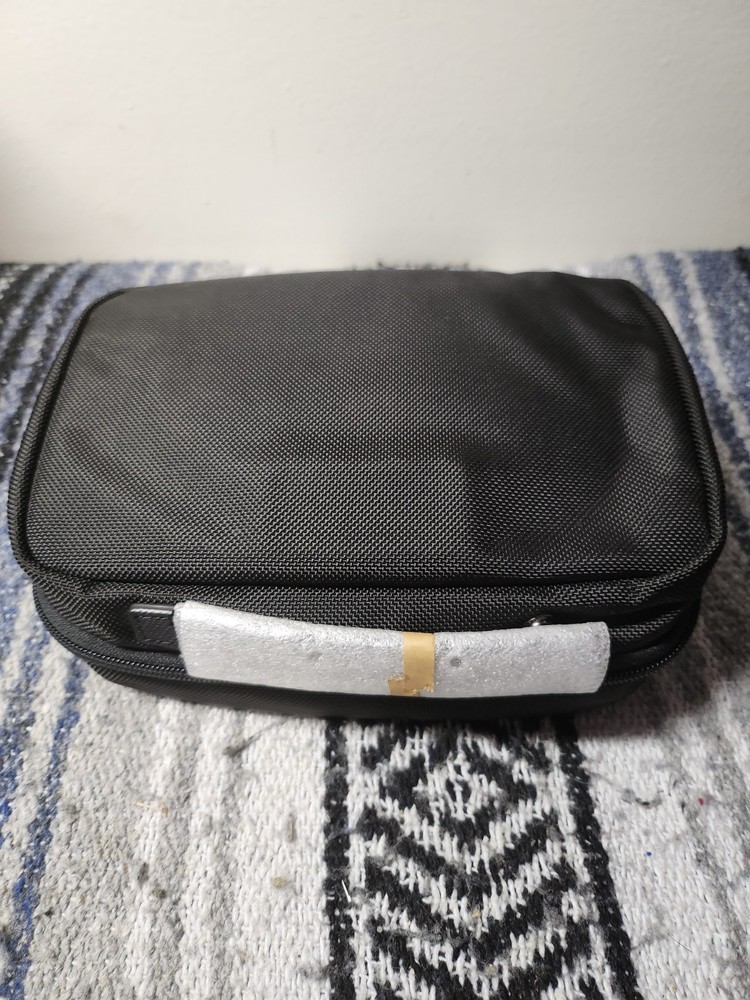 TUMI Split Travel Kit Pre-owned (Orange Bowl Logo) Unused