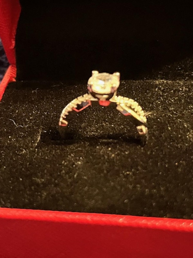 Elegant Silver-Tone Engagement Ring with Clear Stone