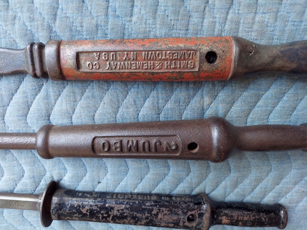 Collection of 8 different antique nail pullers