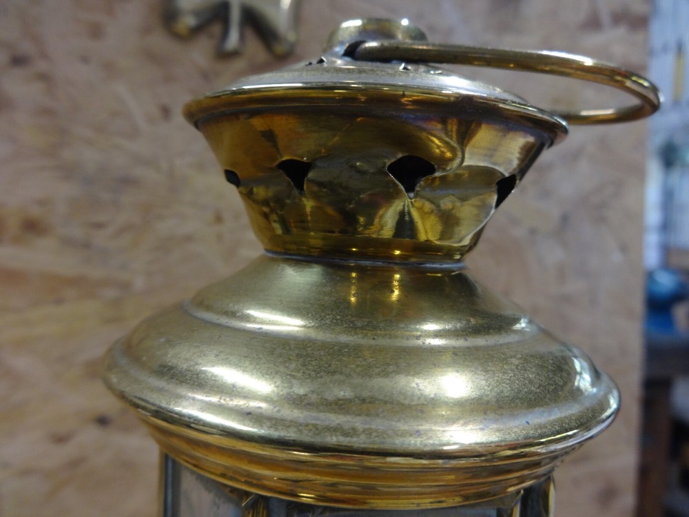 A Brass Candle Lamp.