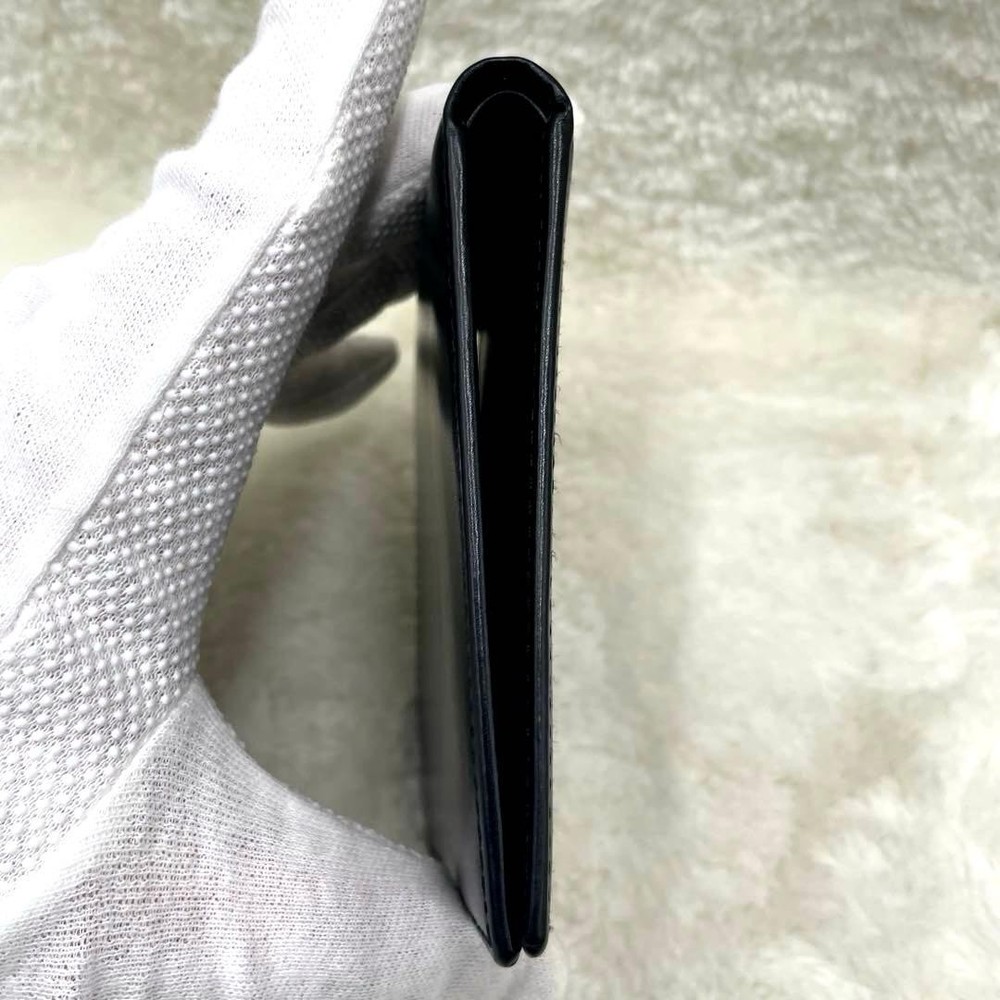 GUCCI Embossed Logo Black Folding Wallet