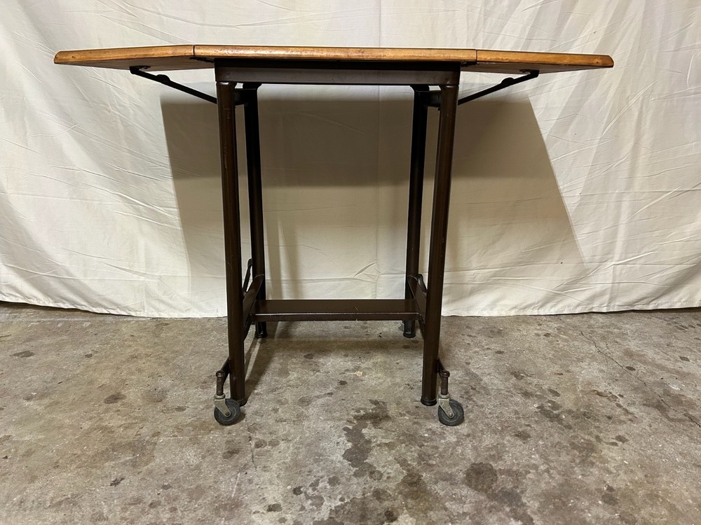 Unique rustic industrial steampunk drop leaf utility table, steel base