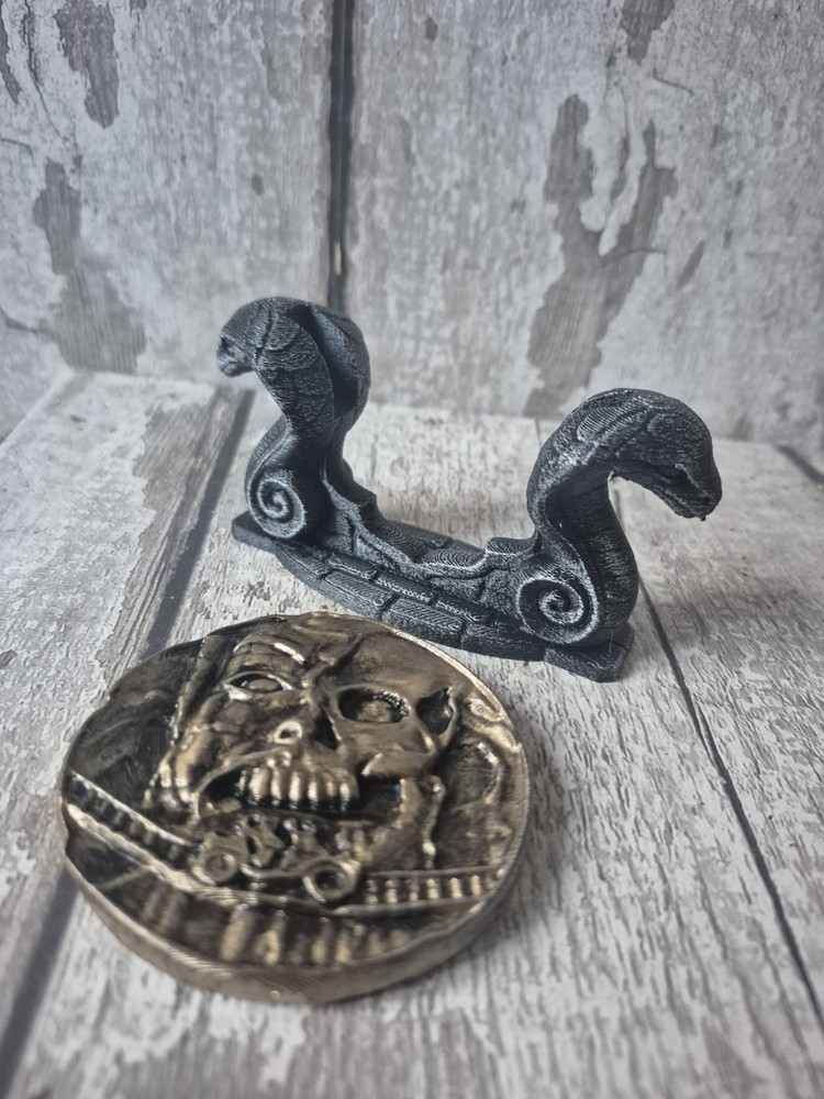 Indiana Jones Maraglyph Decoder Coin and stand
