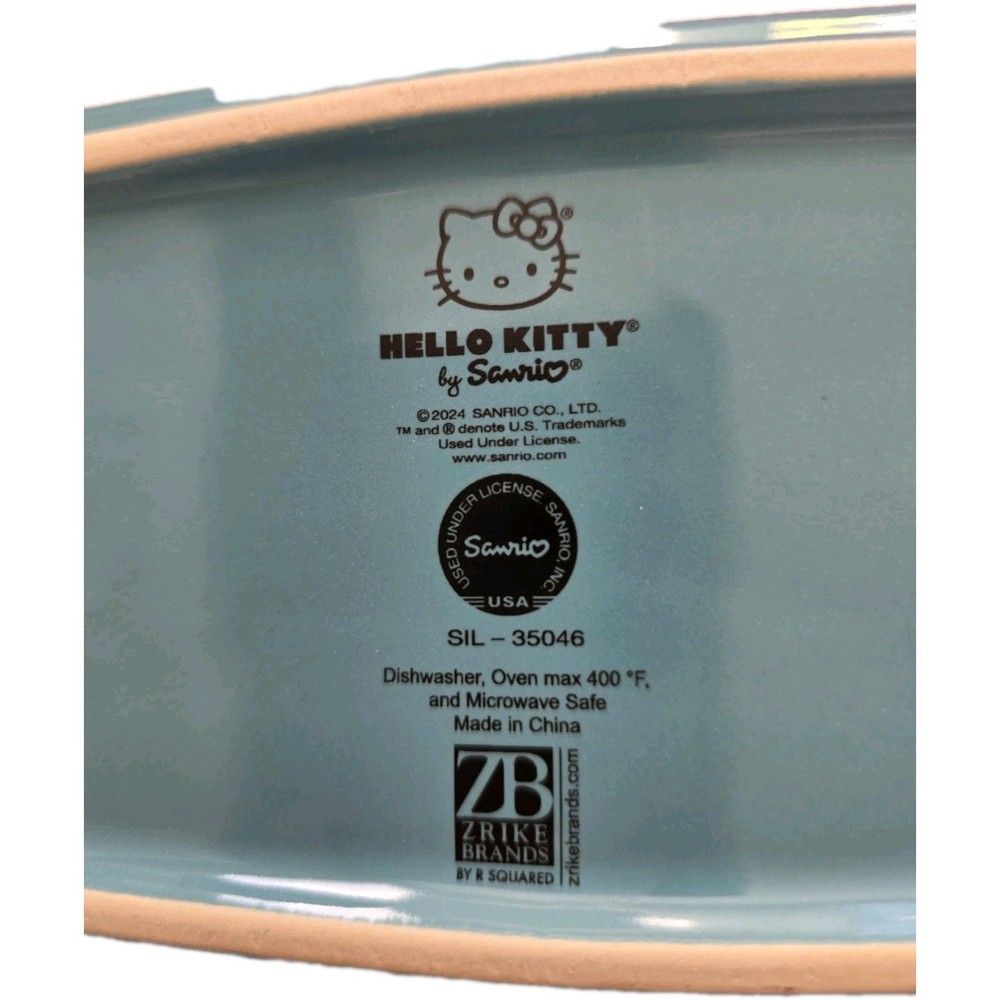 NIB Hello Kitty Ceramic Loaf Pan Let It Snow Globe Design
