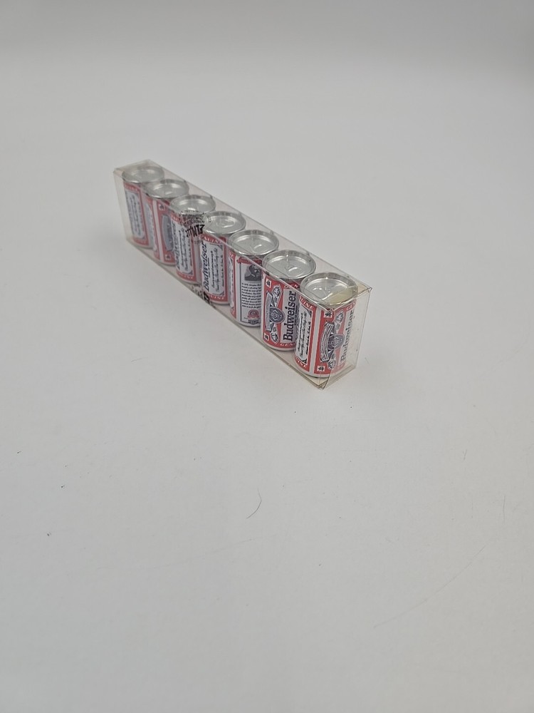 7 Miniture Budweiser cans