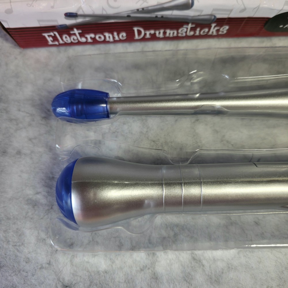 Electronic Rhythm Drumsticks Light Up LED Tips Built in Speakers & Rhythms