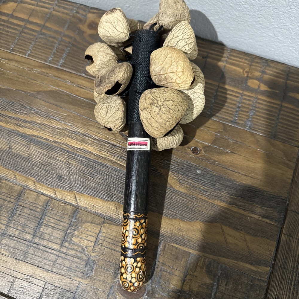 Pangolin Seed Shell Hand Shaker Decorative  Bamboo Handle Hand Made Indonesia