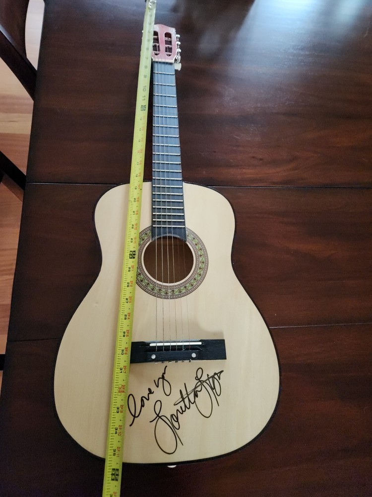 Guitar signed by Loretta Lynn