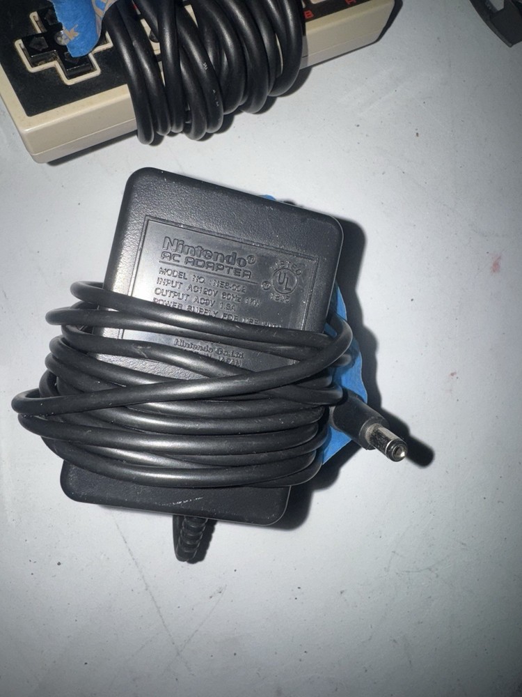 Nintendo Ac Plug And 3 Controllers