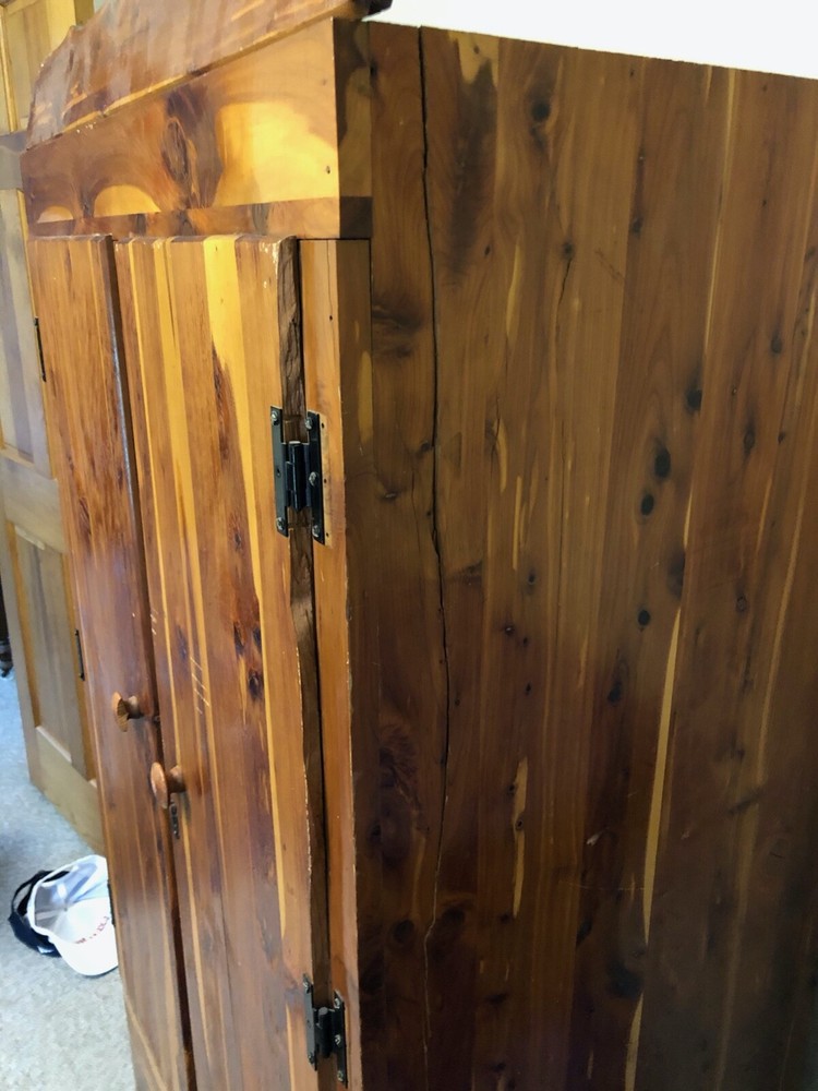cedar wardrobe with hanging bar, 2 latching doors, good condition
