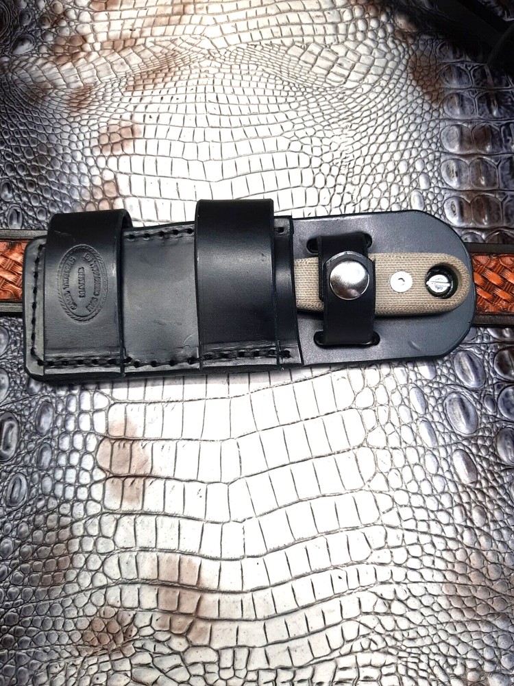 CUSTOM MADE HORIZONTAL LEATHER SHEATH FOR AN ESEE IZUA-ll KNIFE. SHEATH ONLY!