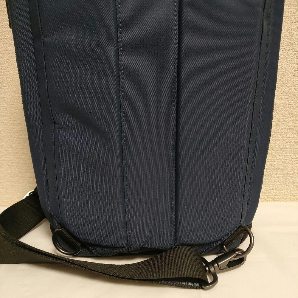 TUMI body bag slingback