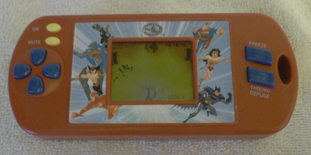 Justice League Save Planet Earth 2005 Techno Source Handheld Game - Tested