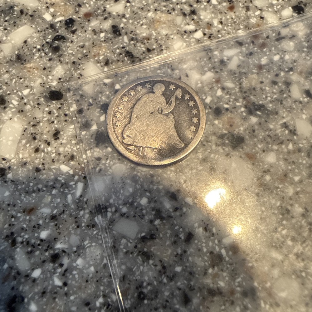 Seated Liberty Silver Half Dime with arrows unreadable date