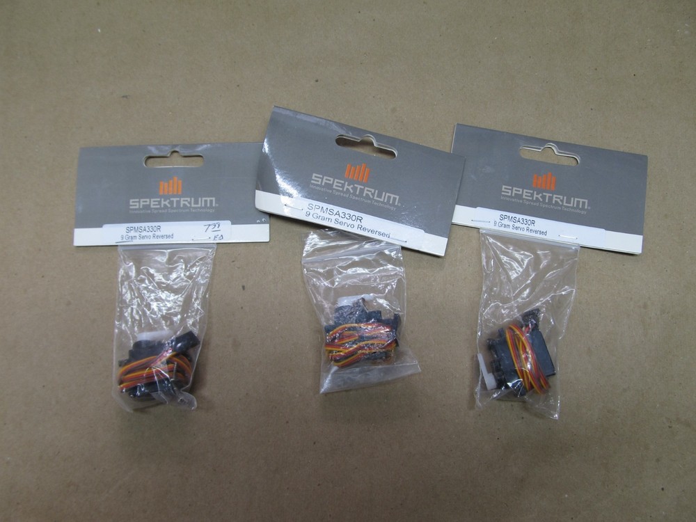 Three Spektrum SPMSA330R Sub Micro Analog Servos