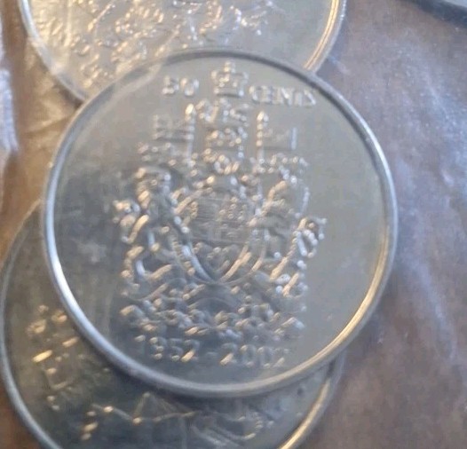 1952 2002 P CANADA 50 CENT HALF DOLLAR JUBILEE BUST CANADA 5 Uncirculated.