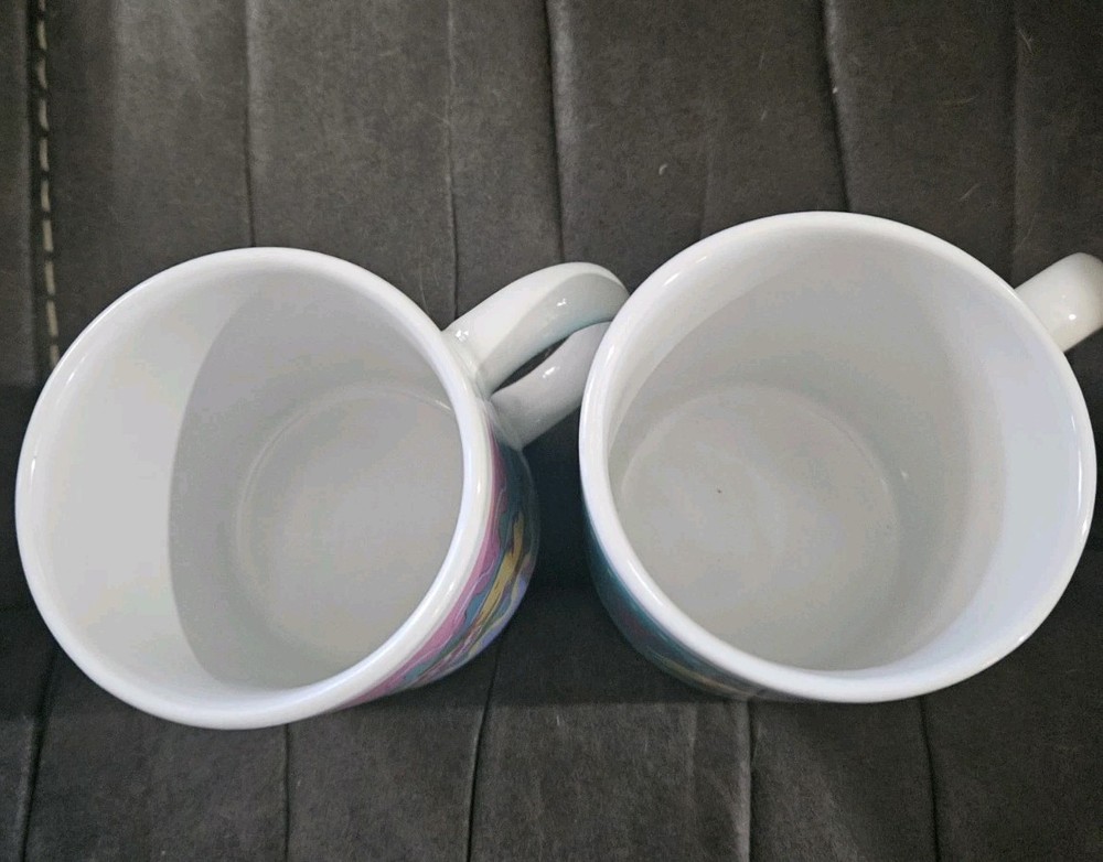 Easter themed ceramic mug set featuring pastel chicks and decorated eggs