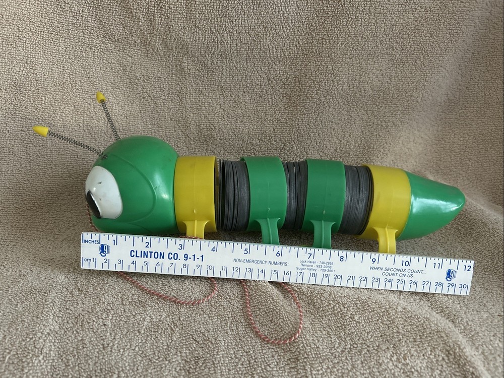Vintage Slinky Cater-Puller Pull Toy