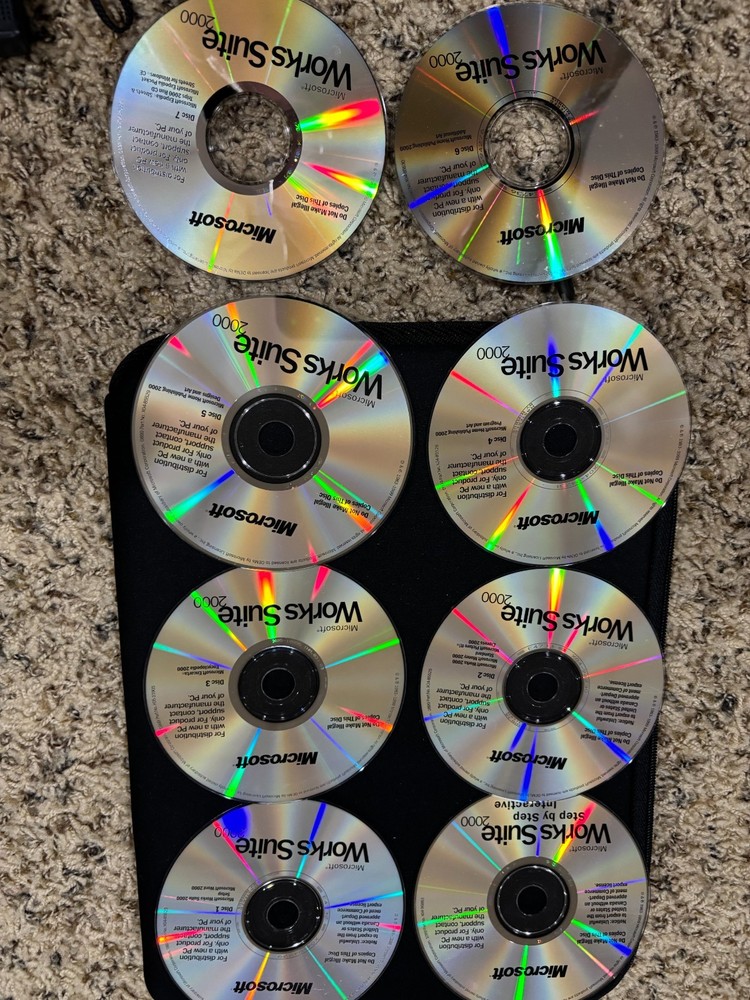 Microsoft Works Suite 2000 Complete 7 Disc +Tutorial PC CD-Rom Set w/Product Key