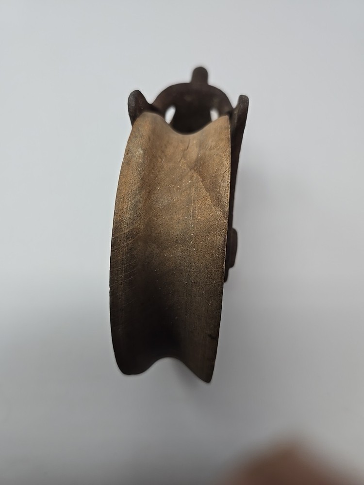 Antique 106 cast iron wood pulley