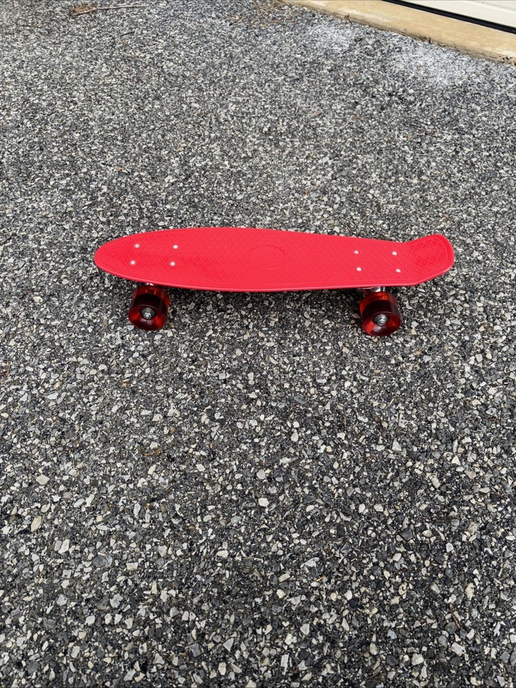 Red Plastic Skateboard With Red Rubber Wheels