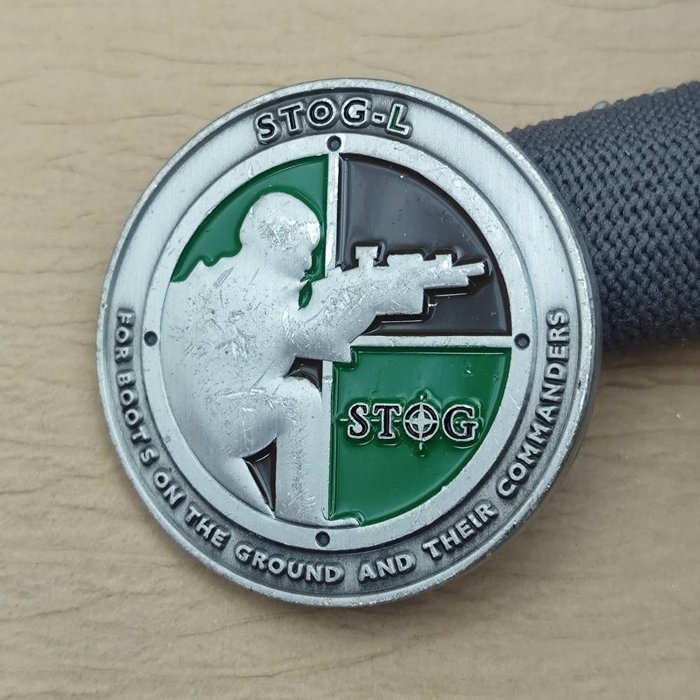 Simulation for Training and Operations Group-Land Challenge Coin