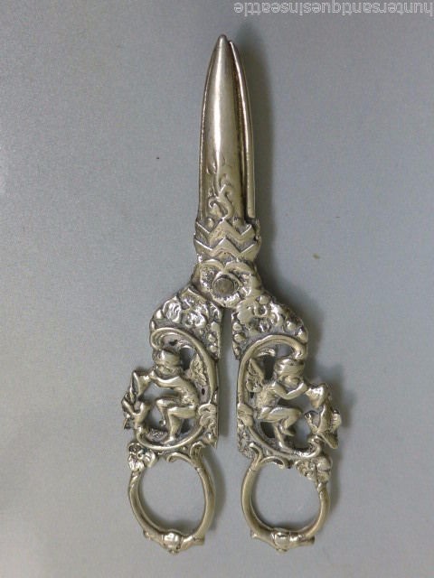 Cherub or Putti playing horn Classical Motif Sterling Grape Shears