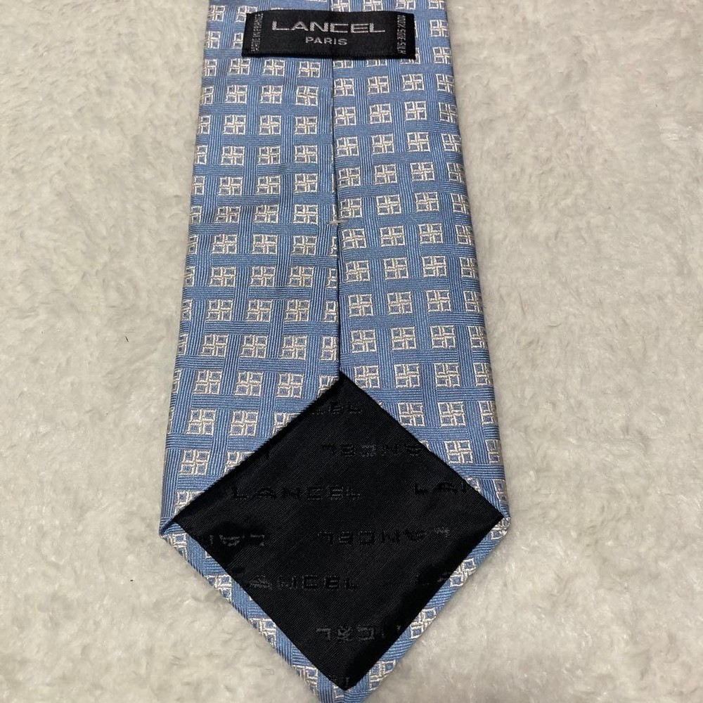 LANCEL PARIS Tie All over pattern 100% silk light blue