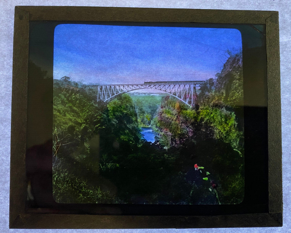 COLORED MAGIC LANTERN SLIDE SOUTH AFRICA BRIDGE OVER RIVER 1920s