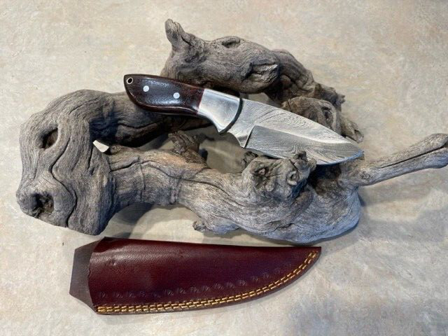 Custom  Carbon Handle Damascus Steel hunter/skinner knife and leather sheath