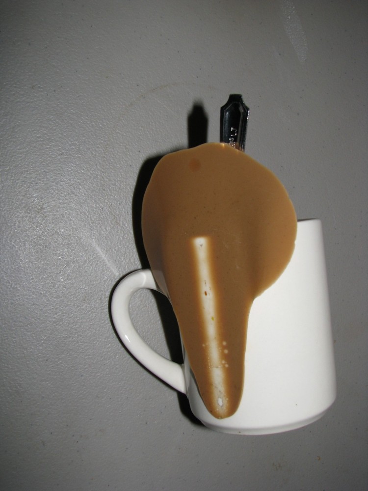 Fake Spilled Coffee Mug Display with Spoon
