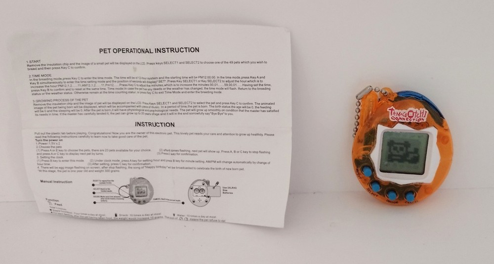 Tamagotchi Connection orange clear/transparent  Tested Works