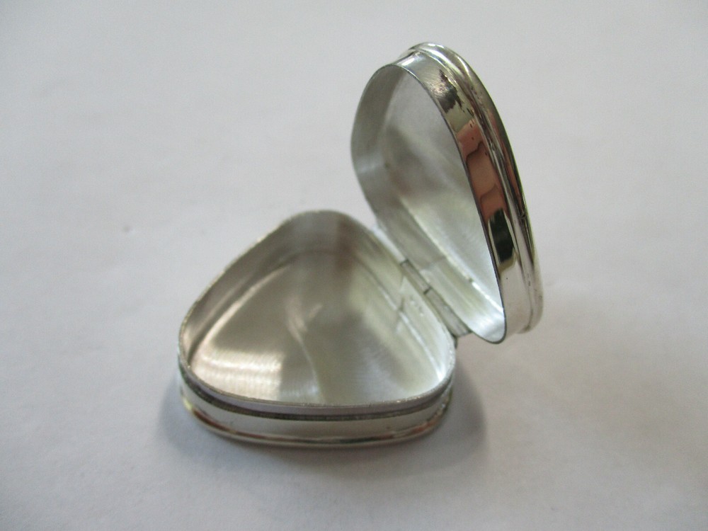 Sterling silver pill box triangle shape engraved with a flower on top hallmarked