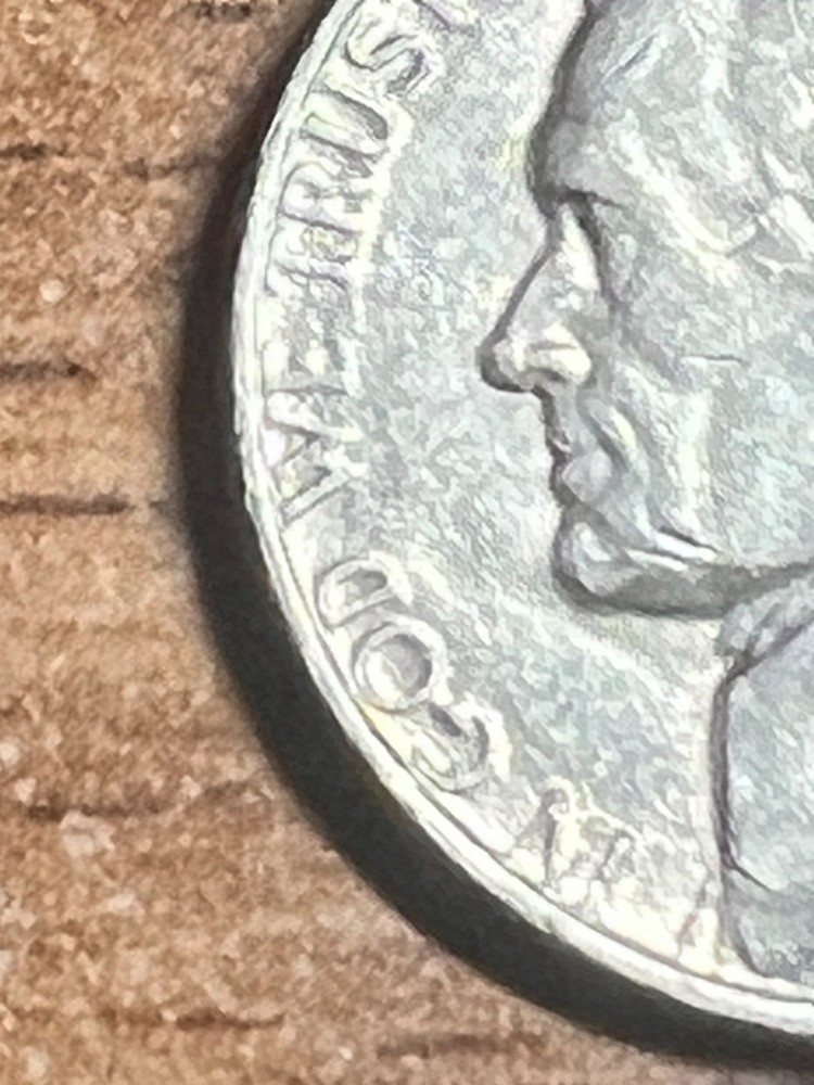 1982 ERROR JEFFERSON NICKEL STRUCK THROUGH AN OBJECT