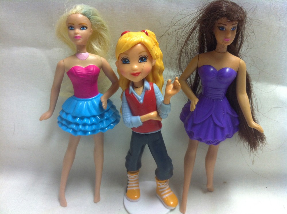Mc Donalds Barbies and One other figure
