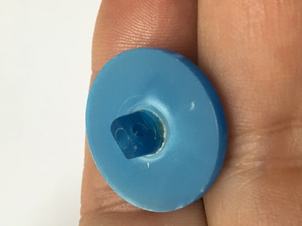 Vintage blue lucite button self shank carved 7/8"